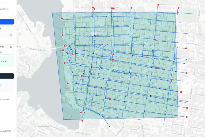 SWMMCanada web app: a drawn boundary over downtown Victoria with the city's real storm network and subcatchments
